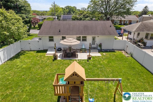 2213 W Woodlawn St, South Whitehall Twp, PA 18104 - back of property with a gate, a playground, a fenced backyard, and a patio area