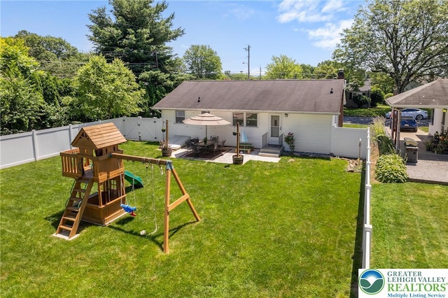 2213 W Woodlawn St, South Whitehall Twp, PA 18104 - back of property featuring a playground, a fenced backyard, a patio, and a gate