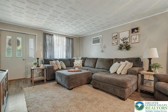 259 5th St, Coaldale Boro, PA 18218 - living area featuring ornamental molding, wood finished floors, and a wall unit AC