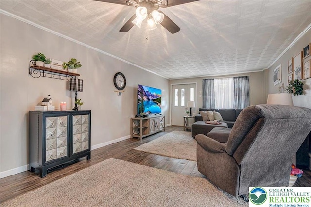 259 5th St, Coaldale Boro, PA 18218 - living room with wood finished floors, a ceiling fan, and ornamental molding