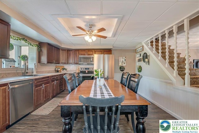 259 5th St, Coaldale Boro, PA 18218 - dining area featuring dark wood finished floors, ceiling fan, and stairs