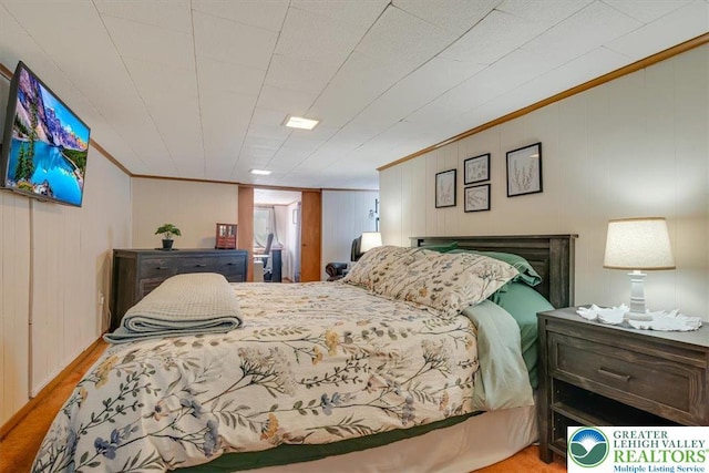 259 5th St, Coaldale Boro, PA 18218 - bedroom with crown molding, wood finished floors, and wooden walls