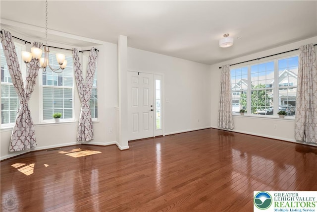 4618 Woodbrush Way, Upper Macungie Twp, PA 18104 - entryway with a chandelier and wood finished floors