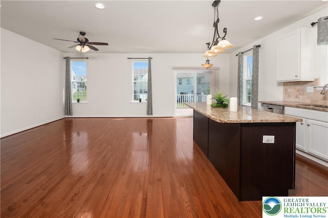 4618 Woodbrush Way, Upper Macungie Twp, PA 18104 - kitchen featuring white cabinets, stainless steel dishwasher, a kitchen island, dark wood-style floors, and recessed lighting
