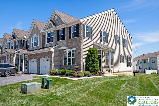 4618 Woodbrush Way, Upper Macungie Twp, PA 18104 - townhome / multi-family property with an attached garage, a front yard, driveway, and stone siding