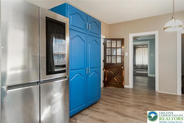 2103 N 1st Ave, Whitehall Twp, PA 18052 - kitchen with smart refrigerator, blue cabinetry, light wood-style floors, and pendant lighting