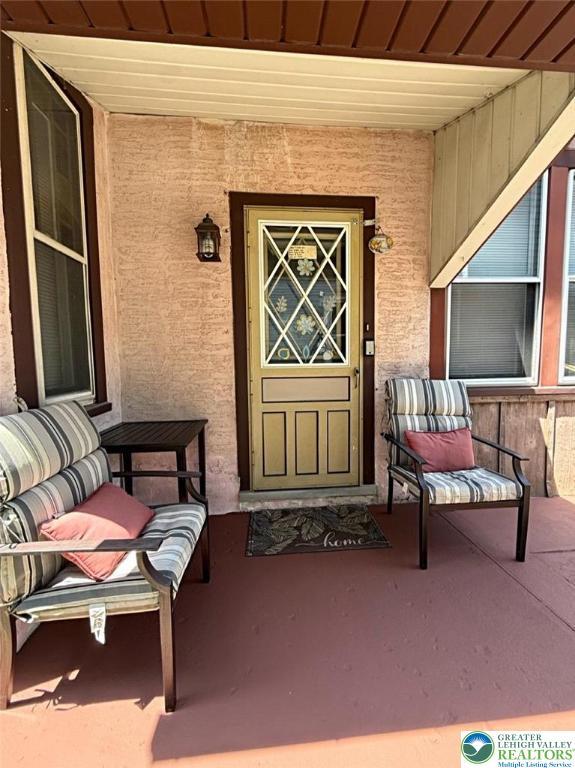 2103 N 1st Ave, Whitehall Twp, PA 18052 - doorway to property with covered porch