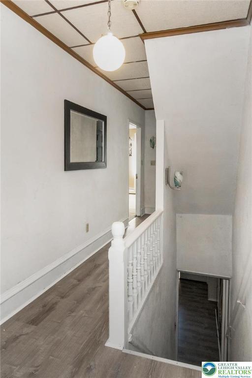 2103 N 1st Ave, Whitehall Twp, PA 18052 - stairway featuring wood finished floors and crown molding