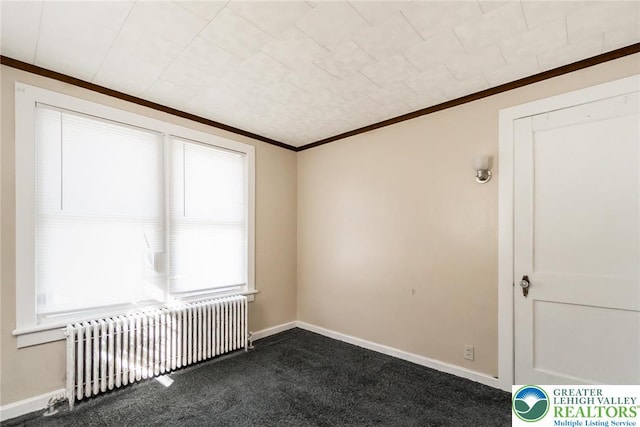 2103 N 1st Ave, Whitehall Twp, PA 18052 - empty room featuring radiator heating unit, crown molding, and dark carpet