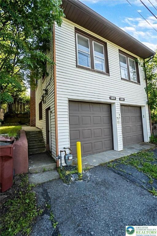 2103 N 1st Ave, Whitehall Twp, PA 18052 - view of property exterior featuring a garage