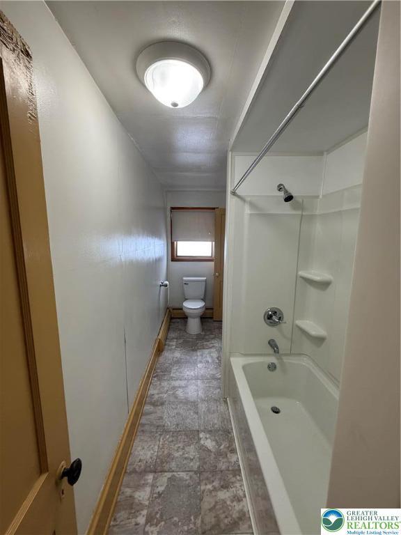 432 3rd St, Lehighton Boro, PA 18235 - bathroom with toilet and bathtub / shower combination