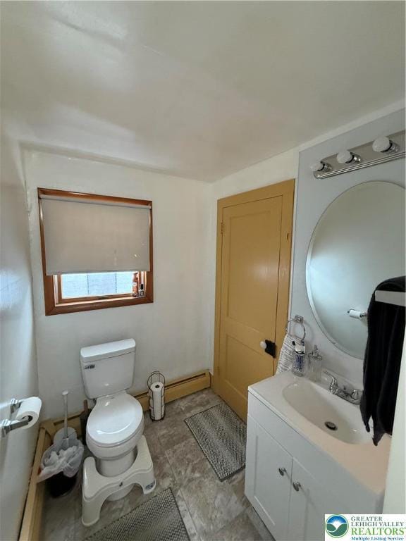432 3rd St, Lehighton Boro, PA 18235 - half bathroom with vanity and a baseboard heating unit