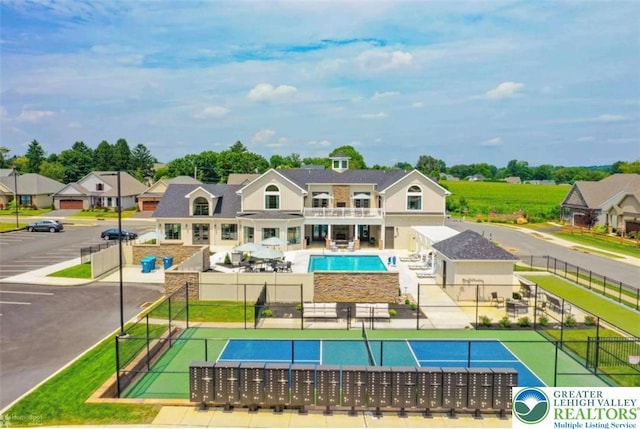 4088 Eveningstar Rd, Emmaus Boro, PA 18049 - view of swimming pool with a tennis court