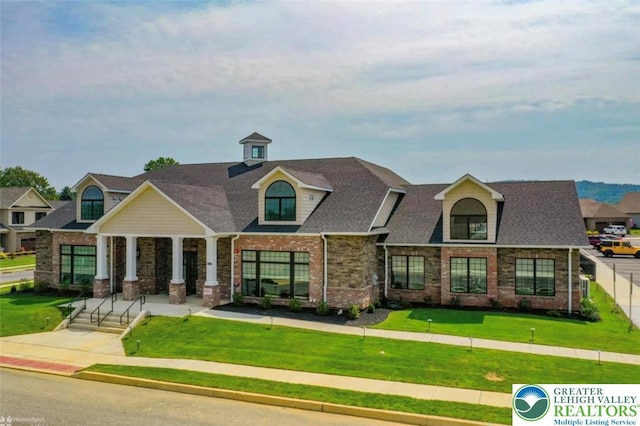 4088 Eveningstar Rd, Emmaus Boro, PA 18049 - craftsman inspired home with brick siding and a front lawn