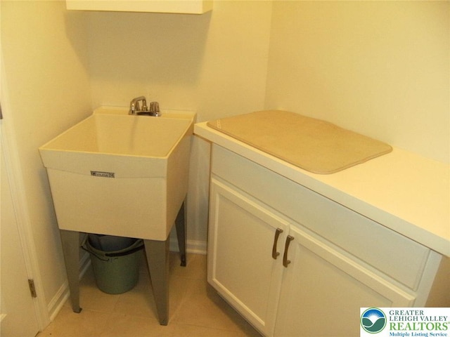 4088 Eveningstar Rd, Emmaus Boro, PA 18049 - washroom with light tile patterned floors and a sink