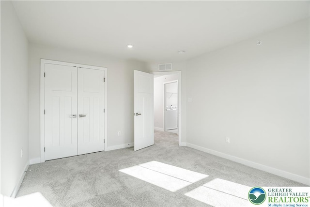 1022 Watson Ct, Upper Macungie Twp, PA 18051 - unfurnished bedroom featuring light colored carpet, a closet, and recessed lighting