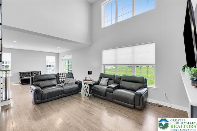 2835 Lenape, Forks Twp, PA 18040 - living area with a high ceiling, wood finished floors, and recessed lighting