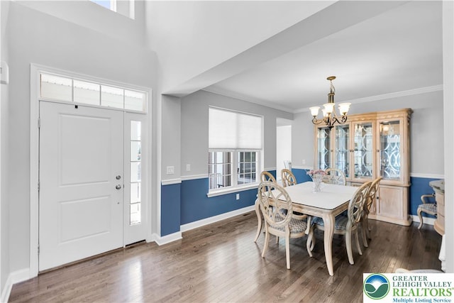 2835 Lenape, Forks Twp, PA 18040 - dining area featuring a chandelier, healthy amount of natural light, wood finished floors, and ornamental molding