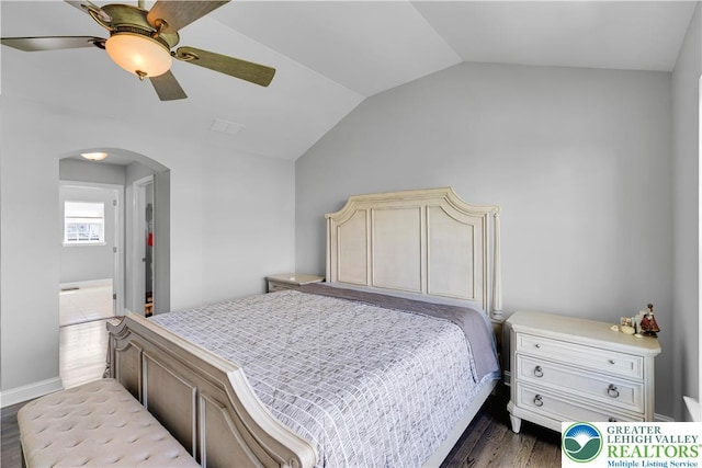 2835 Lenape, Forks Twp, PA 18040 - bedroom featuring arched walkways, dark wood-style flooring, lofted ceiling, and ceiling fan