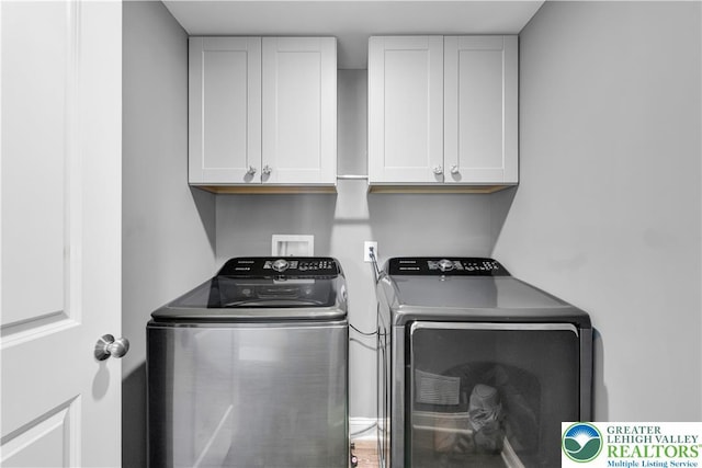 2835 Lenape, Forks Twp, PA 18040 - laundry area with washer and clothes dryer and cabinet space