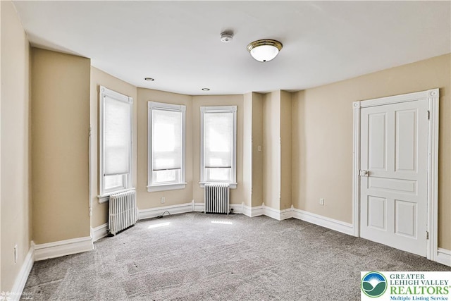 4711 Main St, Whitehall Twp, PA 18052 - unfurnished bedroom featuring radiator heating unit and carpet floors