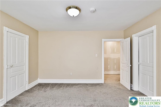 4711 Main St, Whitehall Twp, PA 18052 - unfurnished bedroom featuring carpet floors and baseboards