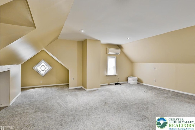 4711 Main St, Whitehall Twp, PA 18052 - bonus room with a wall unit AC, carpet, and lofted ceiling