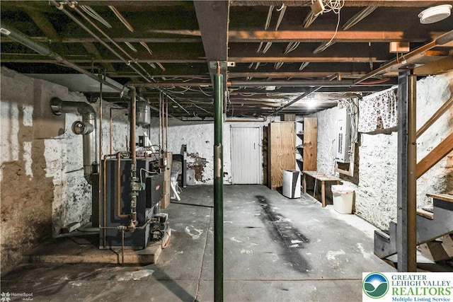 4711 Main St, Whitehall Twp, PA 18052 - unfinished below grade area with a heating unit and electric panel