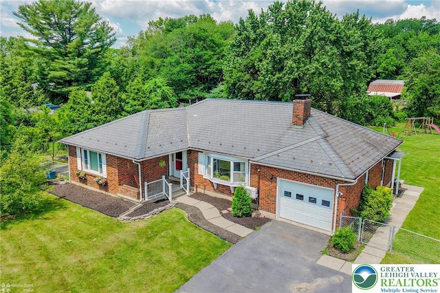 236 Moorestown Rd, Bushkill Twp, PA 18091 - view of front facade featuring brick siding, a garage, a chimney, and asphalt driveway