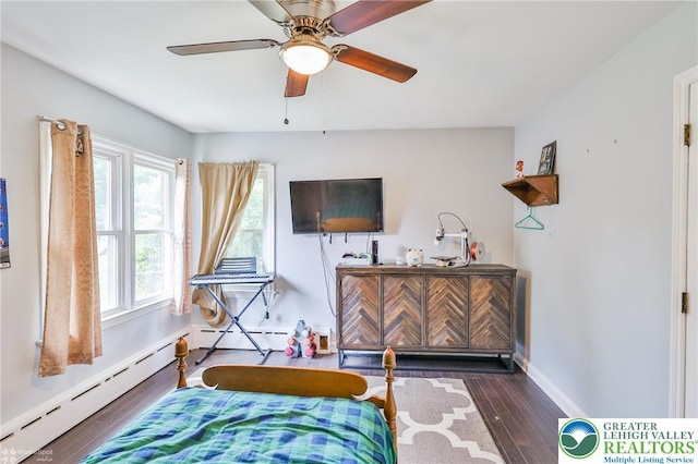 236 Moorestown Rd, Bushkill Twp, PA 18091 - bedroom featuring wood finished floors, a baseboard heating unit, and ceiling fan