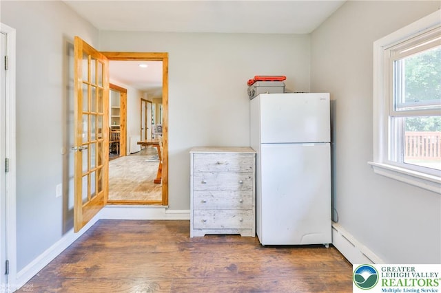 236 Moorestown Rd, Bushkill Twp, PA 18091 - kitchen featuring freestanding refrigerator, wood finished floors, baseboard heating, and french doors