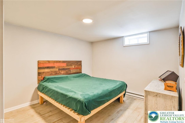 236 Moorestown Rd, Bushkill Twp, PA 18091 - bedroom with baseboard heating, wood finished floors, and pool table