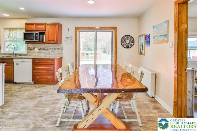 236 Moorestown Rd, Bushkill Twp, PA 18091 - dining room with plenty of natural light, recessed lighting, and radiator heating unit
