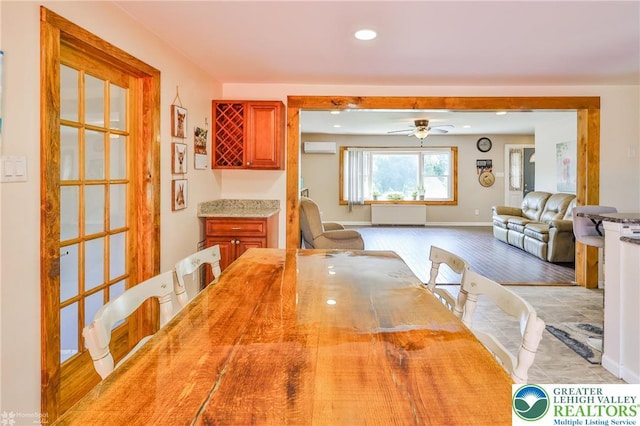 236 Moorestown Rd, Bushkill Twp, PA 18091 - dining room with light wood finished floors, recessed lighting, ceiling fan, and a wall mounted air conditioner