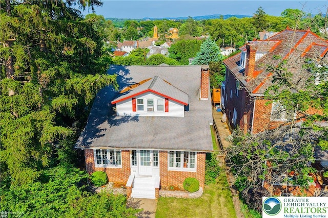650 Highland Ave, Bethlehem City, PA 18018 - view of front of house with brick siding and a shingled roof