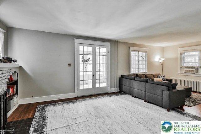 650 Highland Ave, Bethlehem City, PA 18018 - living room featuring radiator heating unit, cooling unit, and wood finished floors