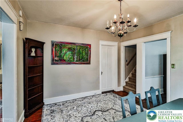 650 Highland Ave, Bethlehem City, PA 18018 - dining area with a chandelier, wood finished floors, and stairs