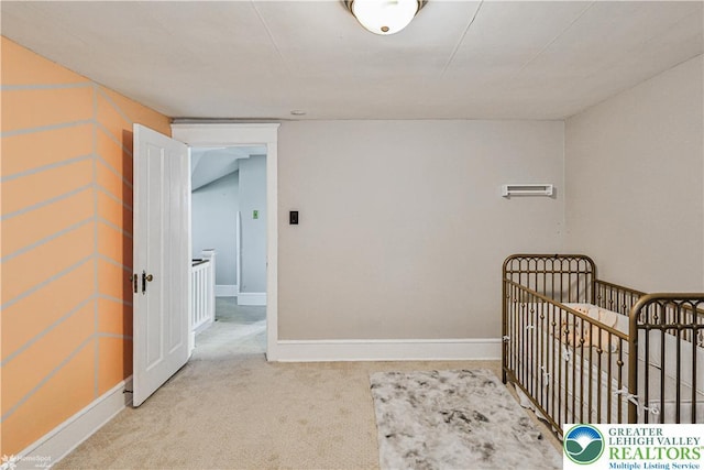 650 Highland Ave, Bethlehem City, PA 18018 - carpeted bedroom featuring baseboards and a nursery area