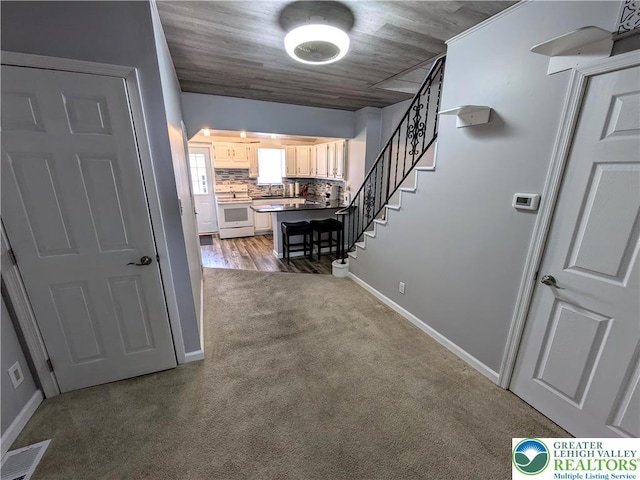 135 N 2nd St, Coplay Boro, PA 18037 - hall featuring carpet flooring and stairs