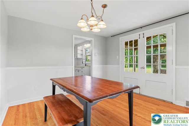 1882 Ridgelawn Ave, Bethlehem City, PA 18018 - dining room featuring a chandelier and light wood-type flooring