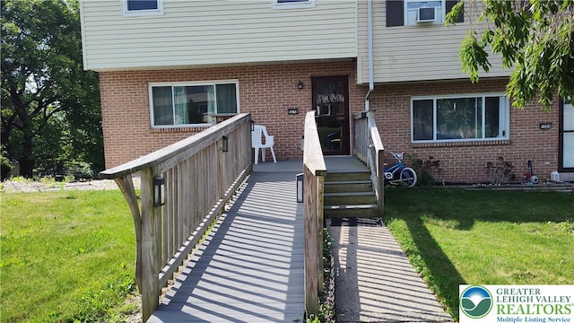 5278 Herman St, Heidelberg Twp, PA 18053 - view of exterior entry with a yard and brick siding