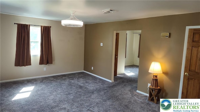 5278 Herman St, Heidelberg Twp, PA 18053 - empty room featuring dark carpet and baseboards