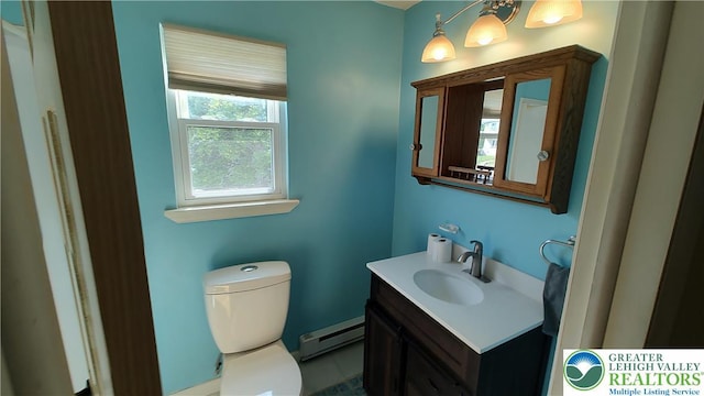 5278 Herman St, Heidelberg Twp, PA 18053 - half bathroom with a baseboard radiator and vanity