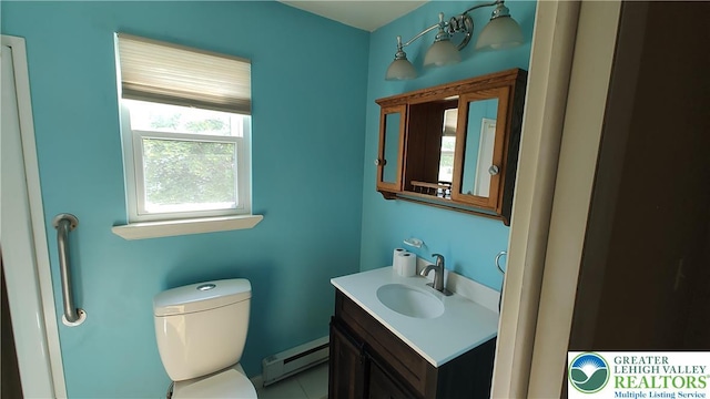 5278 Herman St, Heidelberg Twp, PA 18053 - half bath with baseboard heating and vanity