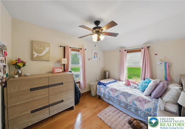 3224 Middle Easton Belmont Pike, Hamilton Twp, PA 18360 - bedroom with light wood-style flooring, ceiling fan, and radiator heating unit
