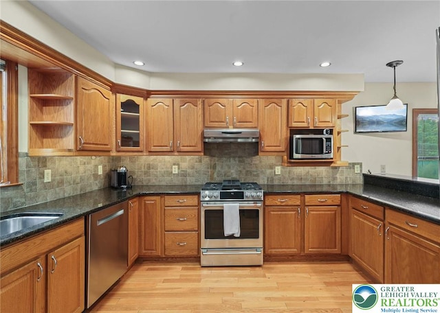 3224 Middle Easton Belmont Pike, Hamilton Twp, PA 18360 - kitchen with appliances with stainless steel finishes, under cabinet range hood, brown cabinets, open shelves, and recessed lighting