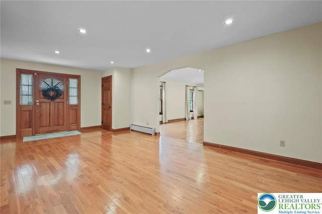 3224 Middle Easton Belmont Pike, Hamilton Twp, PA 18360 - foyer entrance with a baseboard radiator, arched walkways, light wood-style floors, and recessed lighting