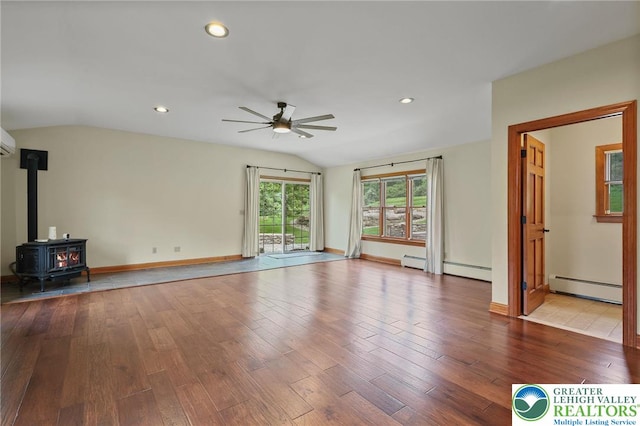 3224 Middle Easton Belmont Pike, Hamilton Twp, PA 18360 - unfurnished living room featuring a baseboard heating unit, ceiling fan, vaulted ceiling, wood finished floors, and recessed lighting