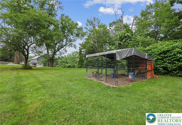 3224 Middle Easton Belmont Pike, Hamilton Twp, PA 18360 - view of grassy yard featuring exterior structure and an outdoor structure