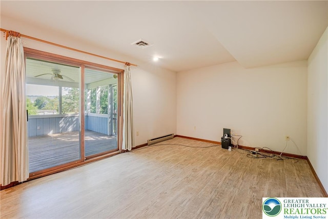 4834 Maple St, Lower Mt Bethel Twp, PA 18013 - unfurnished room featuring baseboard heating and light wood-style flooring